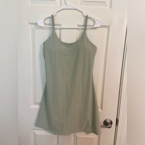 Ovruns green athletic dress with padding. Size small. NWT